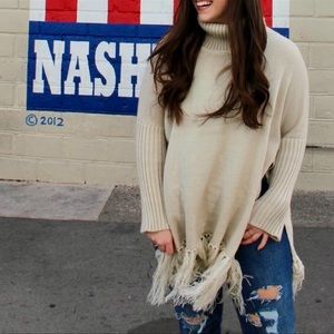 Turtleneck Sweater with Fringe Detail and Slit